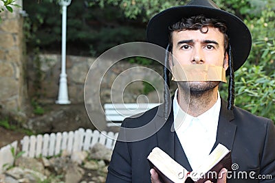 Silenced and sad traditional religious orthodox man Stock Photo