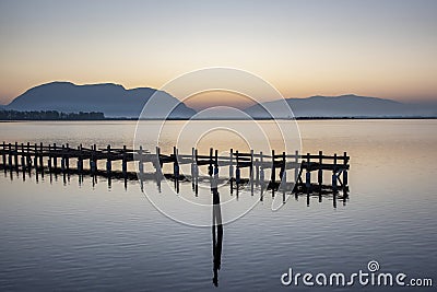 Silent Sunrise with pier Stock Photo