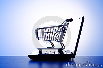 Silhoette of laptop and cart Stock Photo