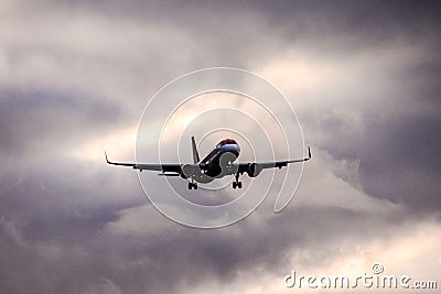 Silhouette airplane flying Editorial Stock Photo