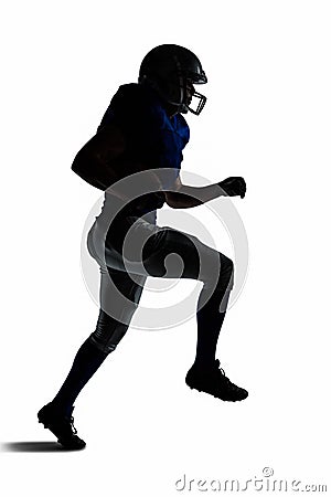 Silhouette American football player runing Stock Photo