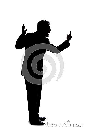 Silhouette of a Businessman Acting Angry Stock Photo