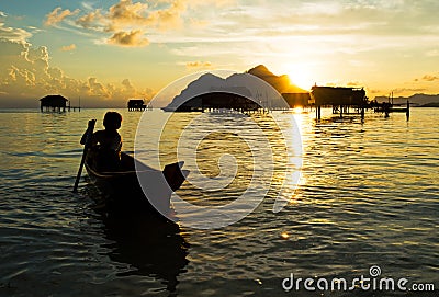 Silhouette of bajau laut in Sabah Borneo Editorial Stock Photo