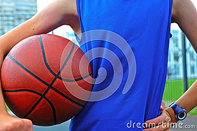 Silhouette of a basketball player outdoor Stock Photo