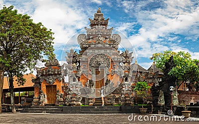 Silhouette beauty young girl, woman on the background Entrance to Balinese Hindu temple Stock Photo