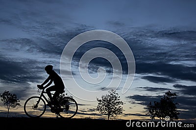 Silhouette bike on sunset Stock Photo