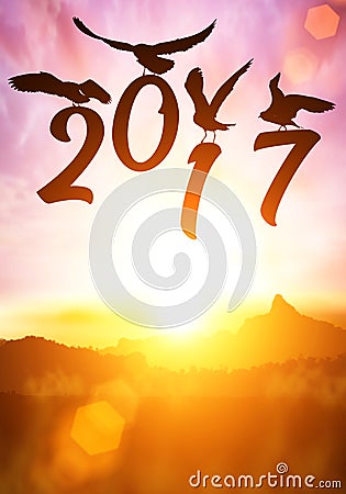 Silhouette of bird Holding Happy new year 2016 text Stock Photo