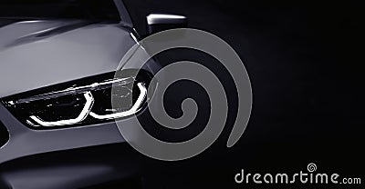 Silhouette of black sport car with LED headlights on black background Stock Photo