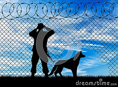 Silhouette of a border guard and a dog Stock Photo