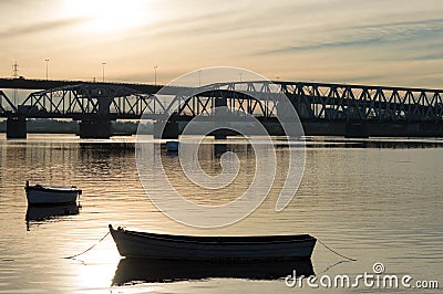 Silhouette of the bridge over the Santa Lucia river at sunset in Uruguay Stock Photo