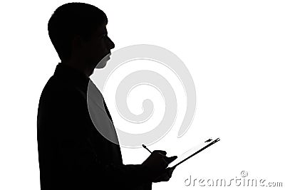 Silhouette of a business man signing a loan Stock Photo