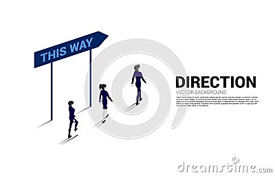 Silhouette businessman and businesswoman walking with direction signage. Stock Photo