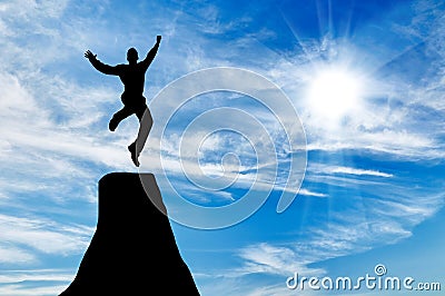 Silhouette of businessman jumping Stock Photo