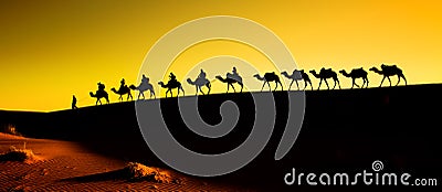 Silhouette of a camel caravan Stock Photo