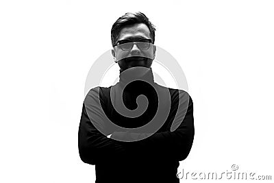 Silhouette of caucasian mature serious man in black poloneck Stock Photo