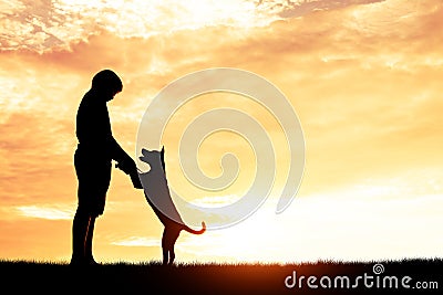 Silhouette child playing with dogs. Stock Photo