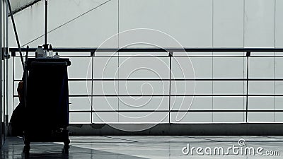 Silhouette of cleaning service people sweeping floor Stock Photo