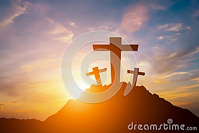 Silhouette of a cross on a hilltop Stock Photo