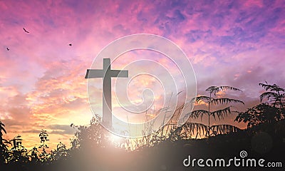 Silhouette the cross on sunset background Stock Photo