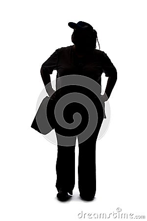 Silhouette of a Woman Standing and Waiting in Line Stock Photo