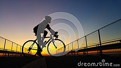 Silhouette of the cyclist Stock Photo