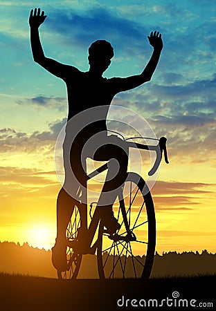 Silhouette of a cyclist on a road bike. Stock Photo