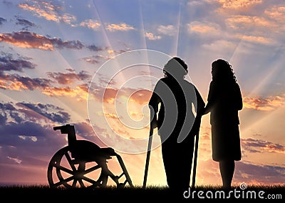 Silhouette disabled near wheelchair and peepers. Concept of a disabled person and home for elderly Stock Photo