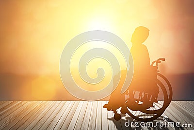 Silhouette of disabled on wheelchair or background.day of the di Stock Photo