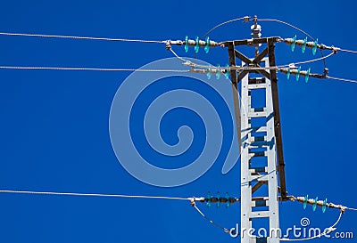 Silhouette electricity post on the background of blue sky Stock Photo