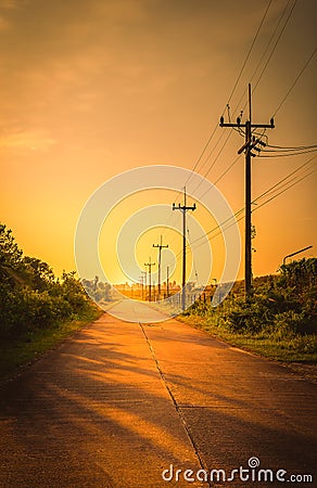 Silhouette electricity post with beautiful sunset Stock Photo