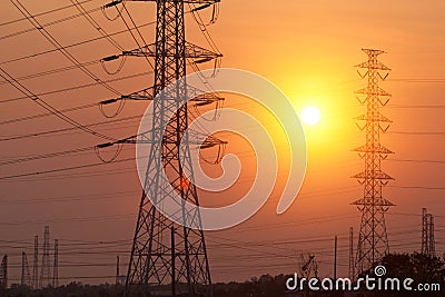 Silhouette electricity post on sunset Stock Photo