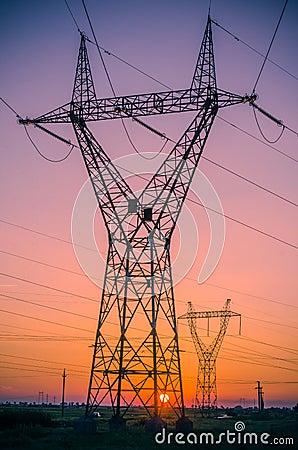 Silhouette electricity pylons Stock Photo