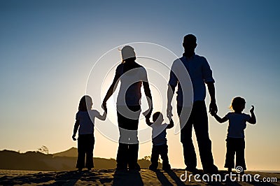 Silhouette of a family of five Stock Photo