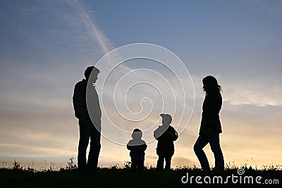 Silhouette family of four Stock Photo
