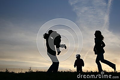 Silhouette family of four Stock Photo