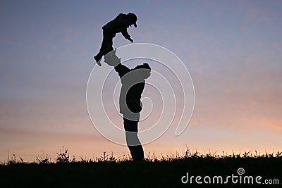 Silhouette father with child Stock Photo