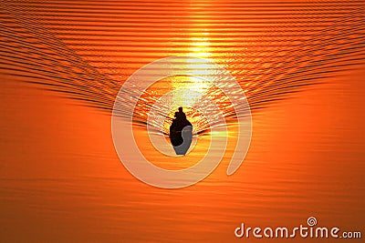 Silhouette of a fisherman in a boat Stock Photo