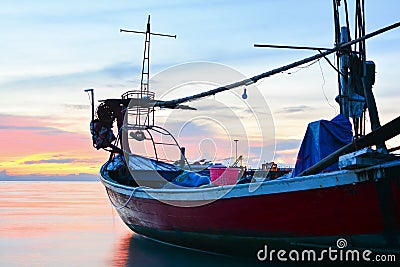 WONDERFUL TWILIGHT SKY AT SEA WITH FISHERMAN Stock Photo