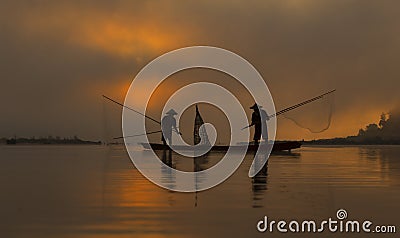 silhouette fisherman Stock Photo