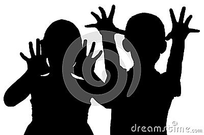 Silhouette frightening children Stock Photo