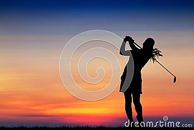 Silhouette golfer playing golf at beautiful sunset Stock Photo