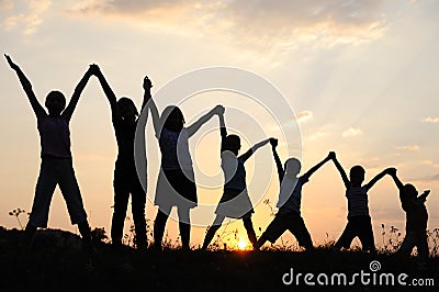 Silhouette, group of happy children Stock Photo