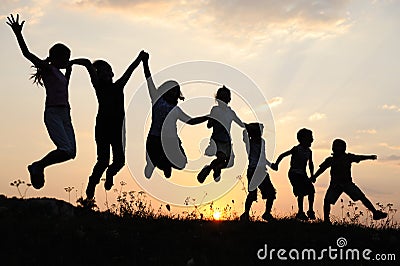Silhouette, group of happy children Stock Photo