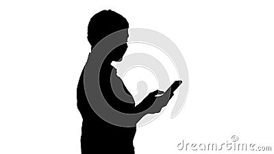 Silhouette Half length portrait of young businesswoman looking at her phone. Stock Photo