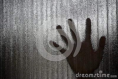 Silhouette of a hand the expression to be imprisoned, blur Stock Photo