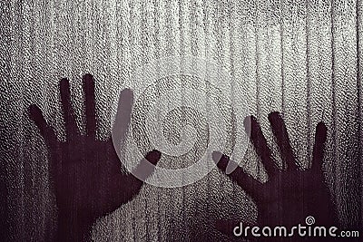 Silhouette of a hand the expression to be imprisoned, blur Stock Photo