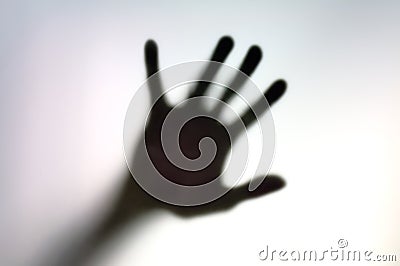 Silhouette of hand on a white surface Stock Photo