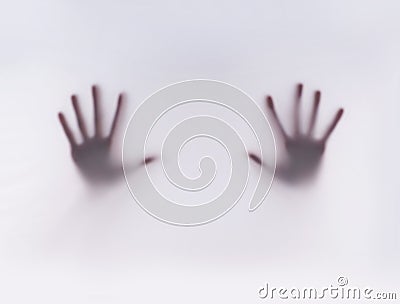 Silhouette of hands on a misty background Stock Photo