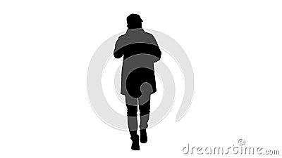 Silhouette Handsome man in light trench coat talking to camera. Focus and think about it gestures. Stock Photo