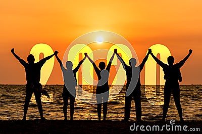 Silhouette happy business teamwork raise hands congratulation and celebrate in Happy New year 2020 for change new life future conc Stock Photo